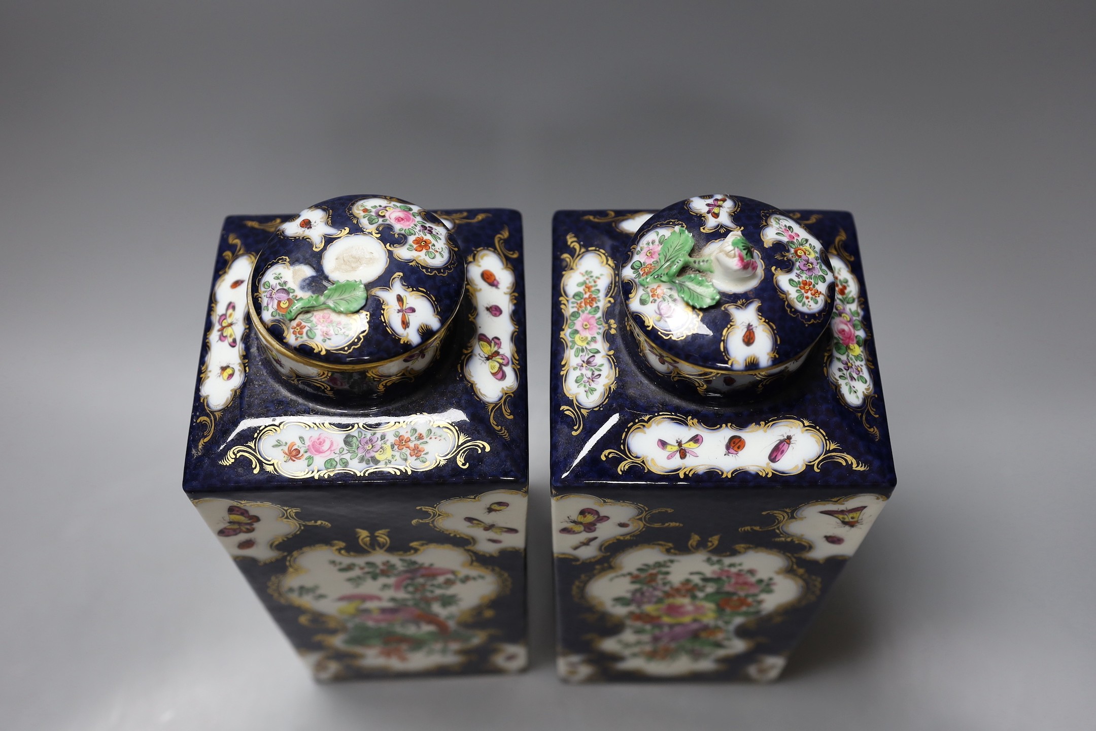A pair of large Samson tea canisters in Worcester style and a 19th century cut glass bowl and cover, canisters 27 cms high
